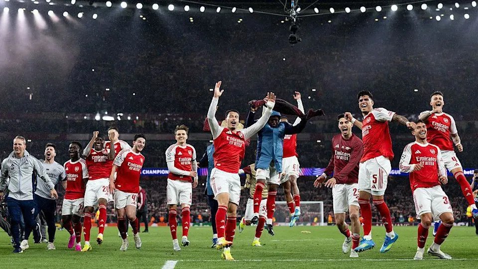 Arsenal players celebrate their Champions League semi-final 
