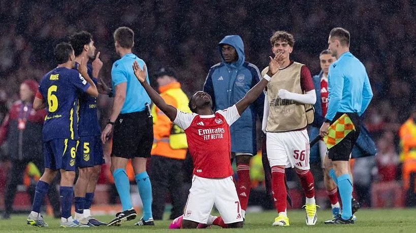 Bukayo Saka celebrates after the full-time whistle 
