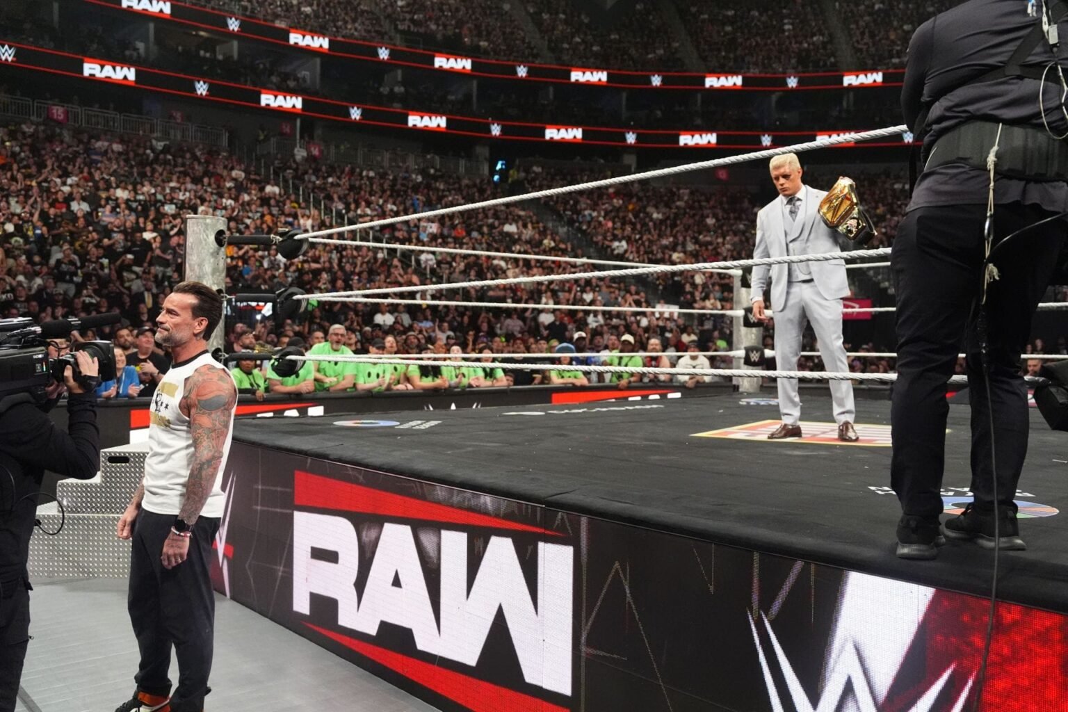 CM Punk and Cody Rhodes kiss male WWE star at a recent live event