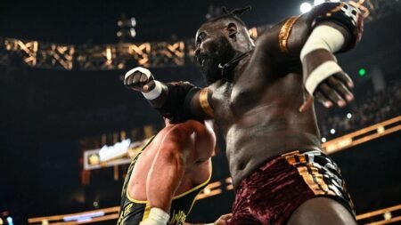 Oba Femi comes to the aid of top tag team being attacked by The Vision at WWE house show in Ecuador